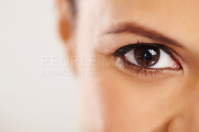 Buy stock photo Woman, closeup and eye care in studio portrait with health, vision and iris for optic wellness by background. Model, person and retina with contact lenses, pupil or eyesight with perspective in Spain