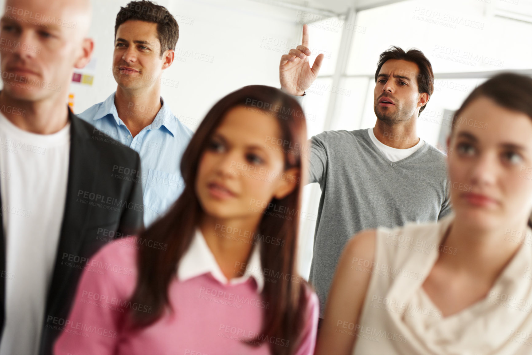 Buy stock photo Meeting, creative and group of frustrated business people with questions, solidarity and protest in office. Workshop, women and man with hand up, doubt and confused team at seminar with feedback.