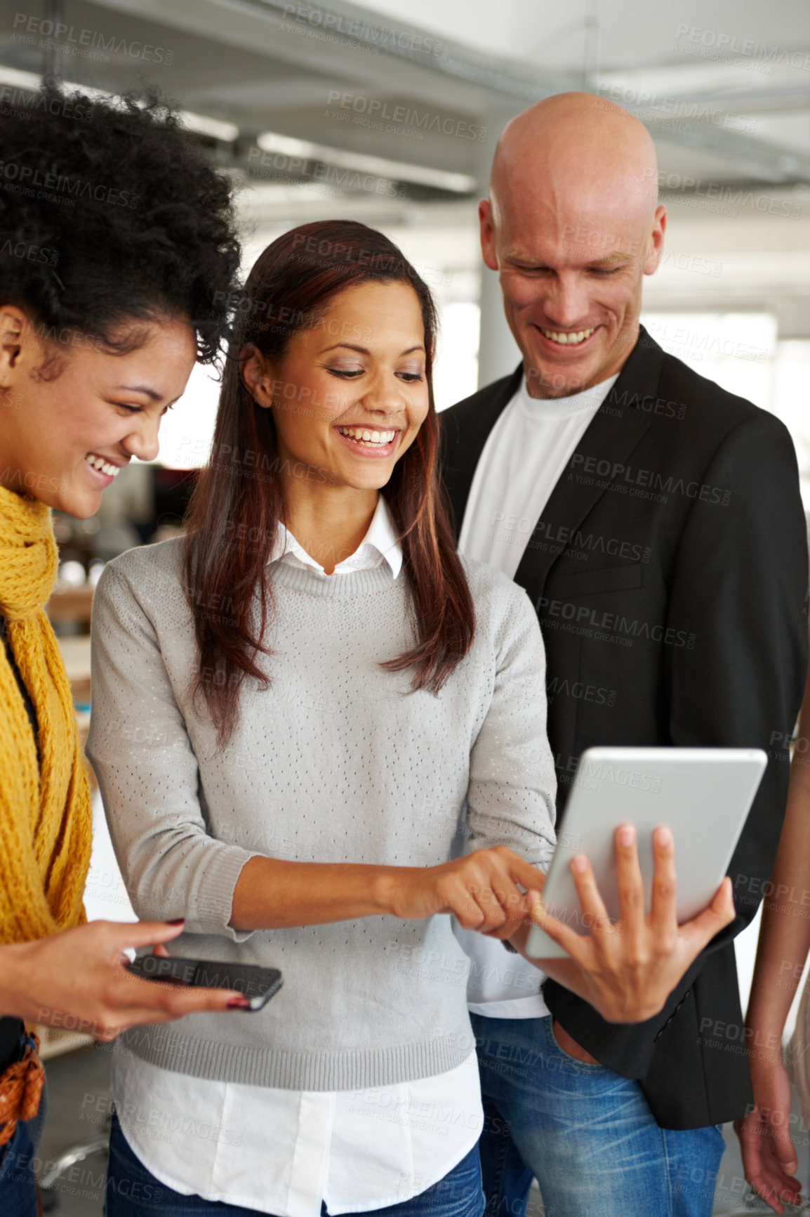 Buy stock photo Shot of a diverse group of colleagues in an office