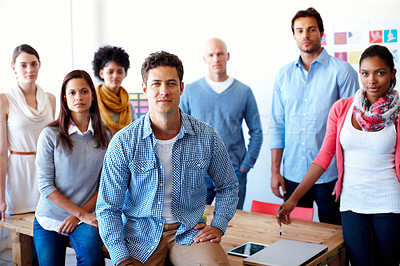 Buy stock photo Shot of a group of casually dressed businesspeople in the office