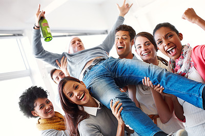 Buy stock photo Business people lifting man with with beer in office after party, celebration and social event at work. Alcohol, comic and drunk colleague crowdsurfing with group of workers in corporate workplace