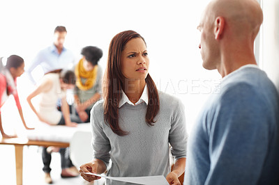 Buy stock photo Business woman with paperwork, businessman and argue with disagreement in office with conflict and company meeting. Mistake in documents, frustrated and angry female with man and problem at office.