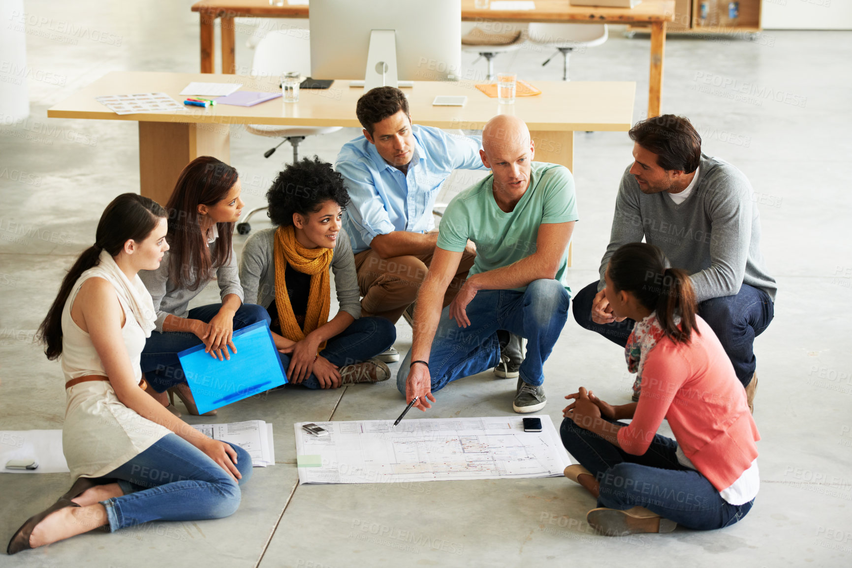 Buy stock photo Shot of a group of casually dressed businesspeople in the office