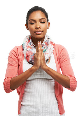 Buy stock photo A young woman meditating with her eyes closed