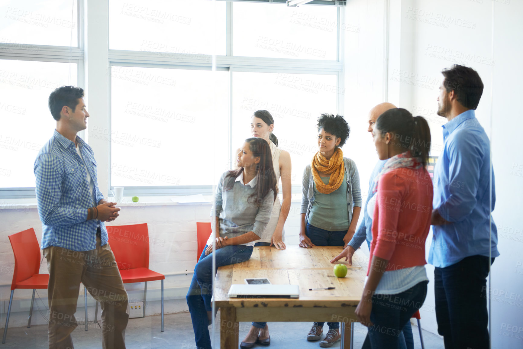 Buy stock photo Business people, group and workshop meeting in office for team building, questions and conversation. Professional, happy employees and diversity collaboration with speaker in boardroom for discussion