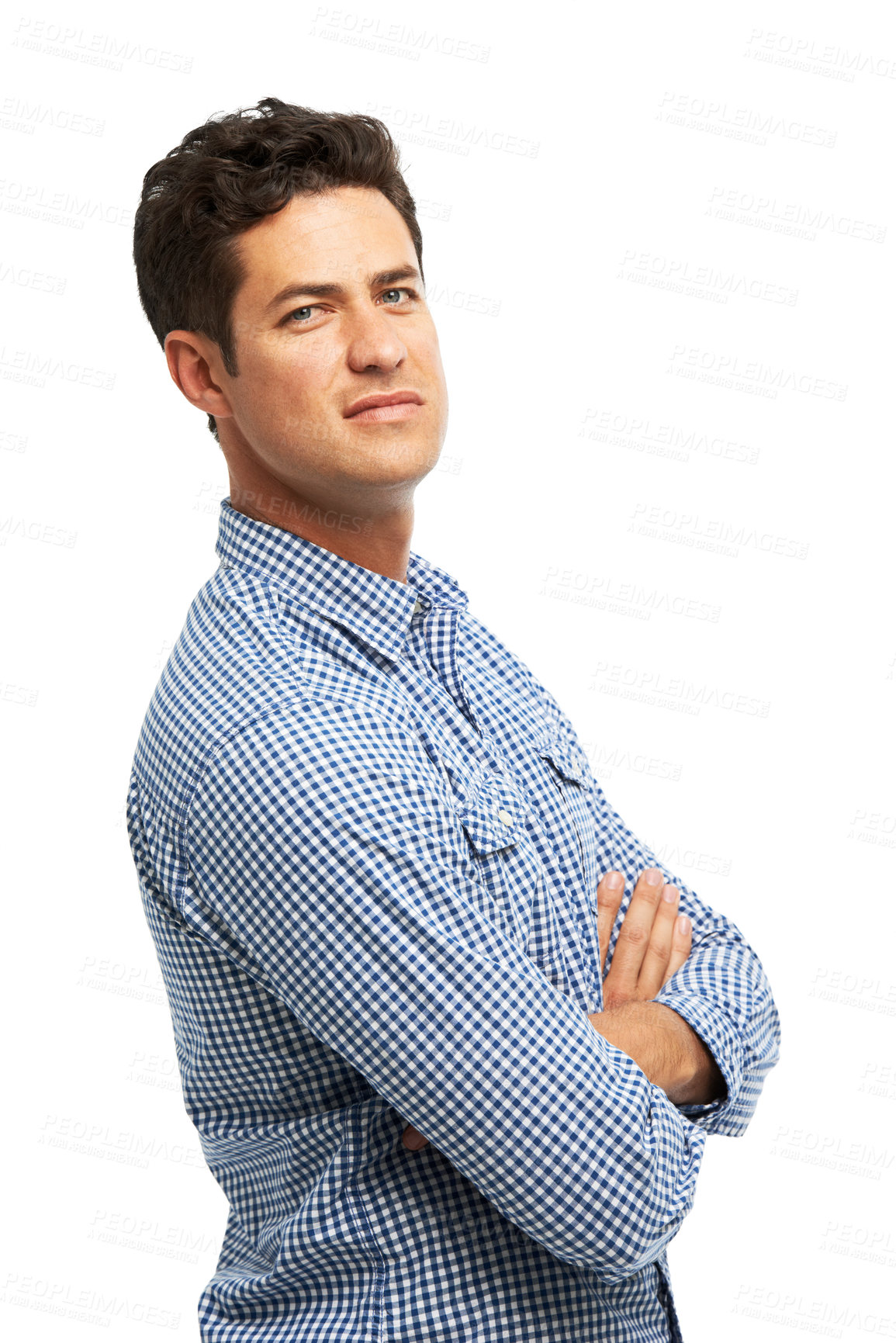 Buy stock photo Sneering man standing with his arms folded against a white background