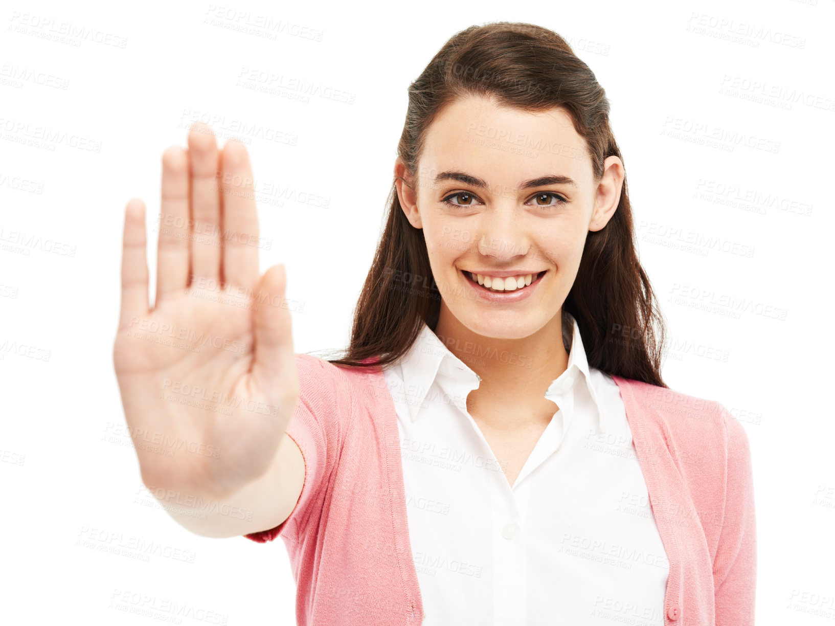 Buy stock photo Young woman showing a stop hand gesture against a white background