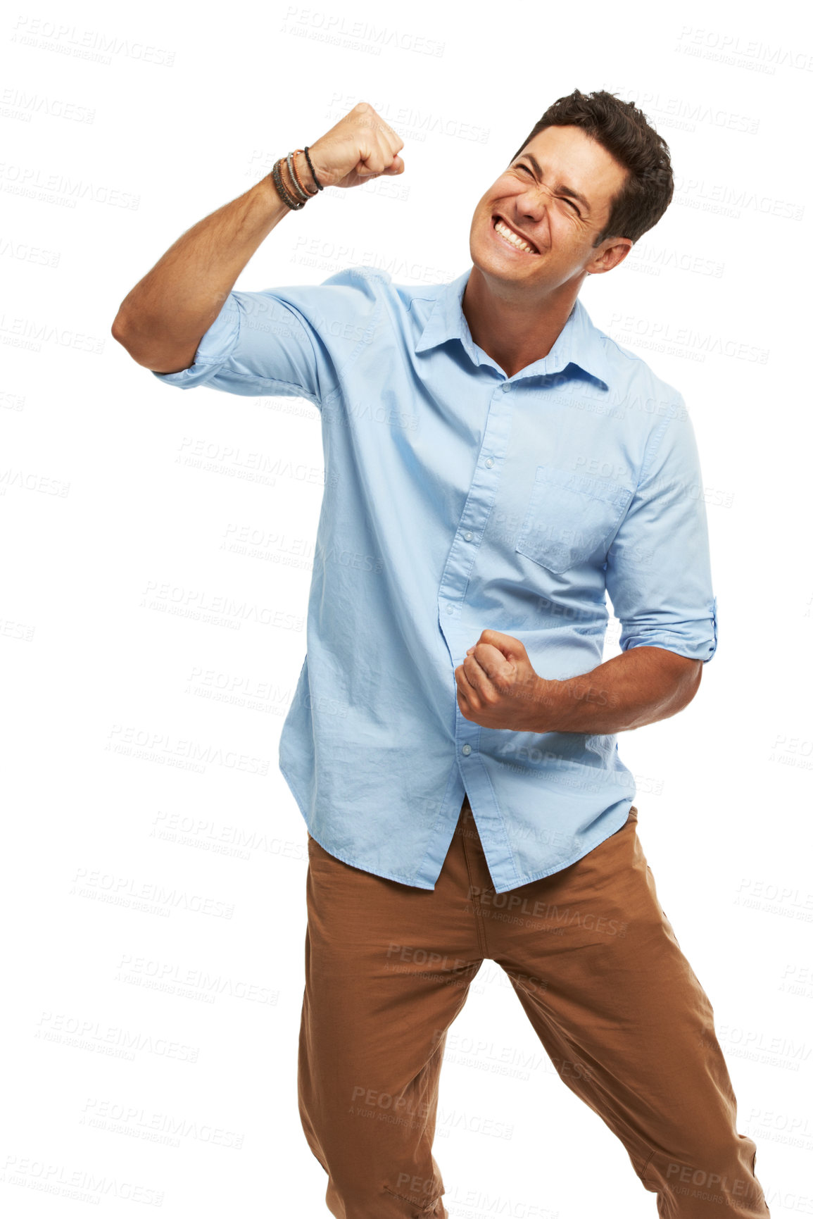 Buy stock photo Happy, man and fist with celebration in studio for competition, announcement and achievement. Excited, winner and male person with smile for promotion, opportunity and success on white background