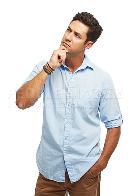 Buy stock photo A thoughtful young man looking upwards while isolated on a white background