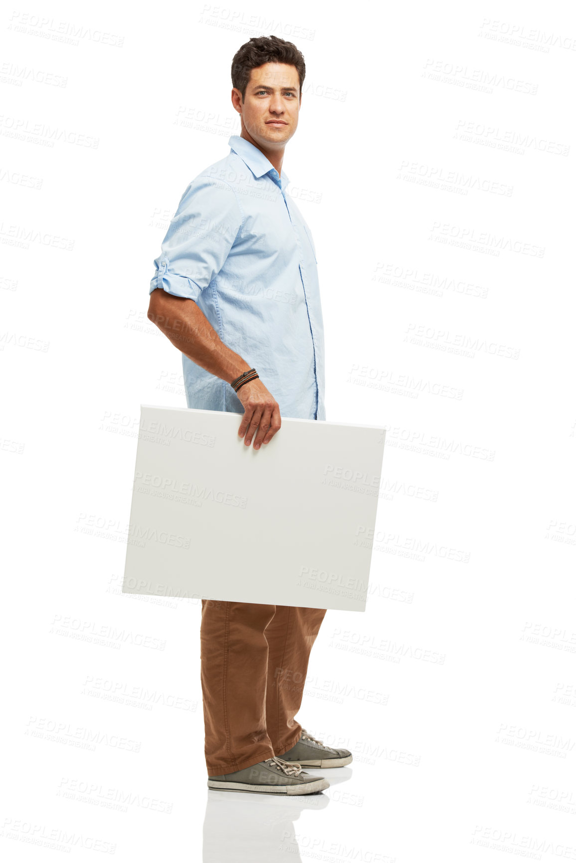 Buy stock photo Mockup, poster and portrait of man in studio for news, announcement and information.Text space, promotion and isolated person with sign, banner and billboard for advertising on white background