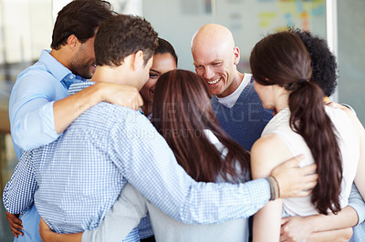 Buy stock photo Teamwork, collaboration and group huddle of business people in office for team building. Motivation, support and team, employees and coworkers hug together for mission, goals or targets in workplace
