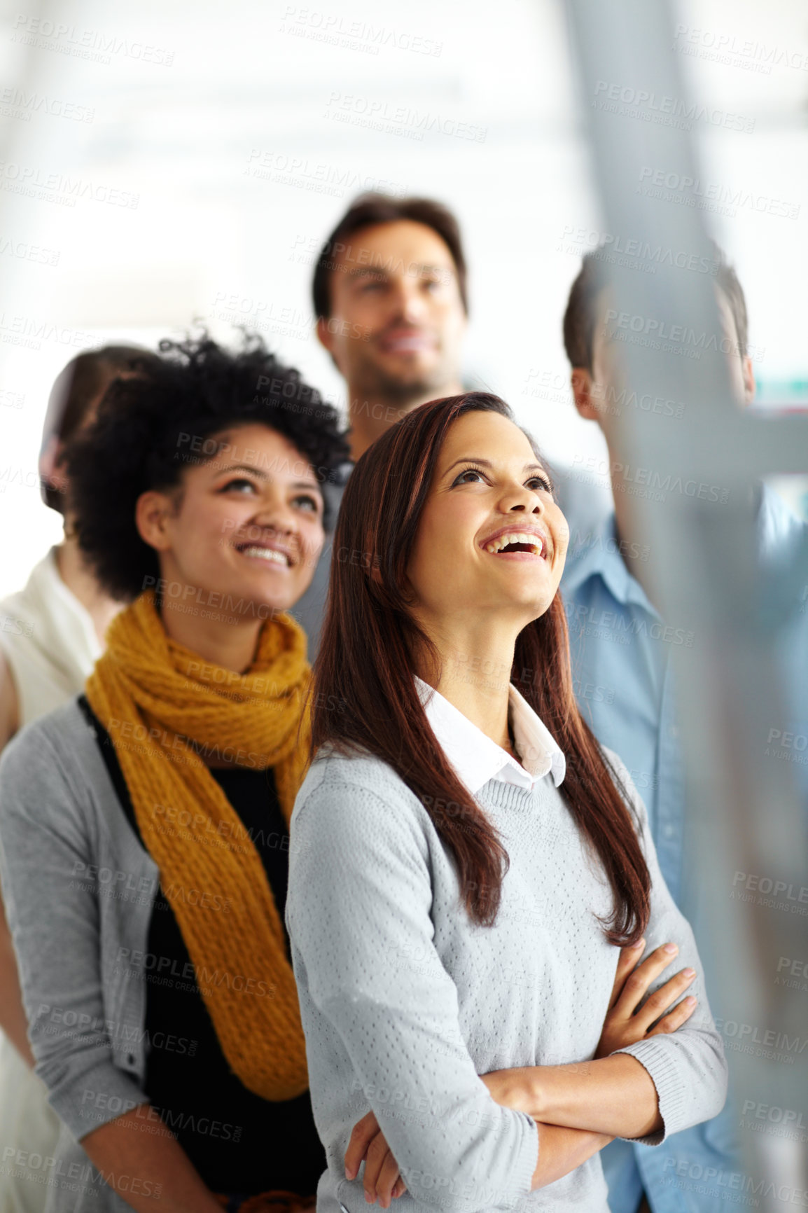 Buy stock photo Business people, smile and looking up in office for workshop, presentation or safety training with ladder. Diversity, group and employees in workplace for team building, collaboration and meeting