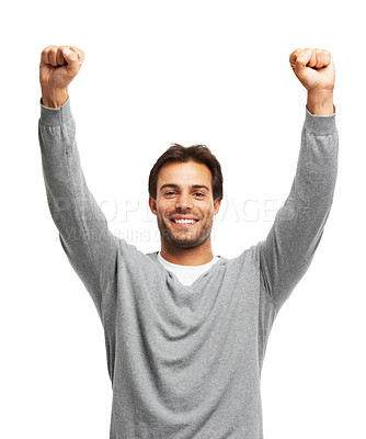 Buy stock photo Cheerful, excited and man in studio for success, achievement and celebration in creative agency. Happy winner, male person and yes with fist gesture by white background for victory, target or winning