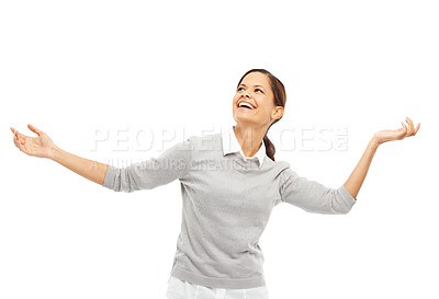 Buy stock photo Happy woman, dancing and carefree with hands out for celebration or music in studio on a white background. Young, female person or excited model with smile for freedom, winning or good news in relief