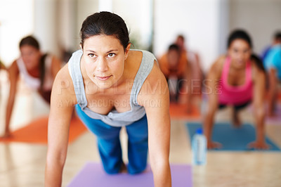 Buy stock photo Flexible, yoga and woman in class for stretching, exercise and mindfulness on mat with group. Pilates, fitness and female person with balance, wellness or agility for muscle relax in zen session.