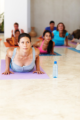 Buy stock photo Exercise, yoga and personal trainer with class for stretching, fitness and workout on mat. Pilates, club and instructor with men and women for wellness, balance and flexibility for healthy body