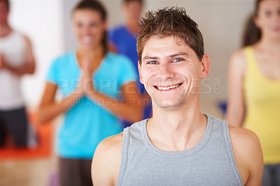 Buy stock photo Man, portrait and instructor at yoga class, exercise and group for mediation in namaste position. Male person, yogi teacher and coach for mindfulness at studio, support people and trainer for chakra