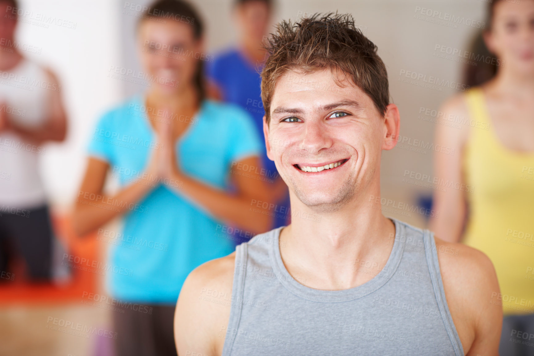 Buy stock photo Man, portrait and instructor at yoga class, exercise and group for mediation in namaste position. Male person, yogi teacher and coach for mindfulness at studio, support people and trainer for chakra