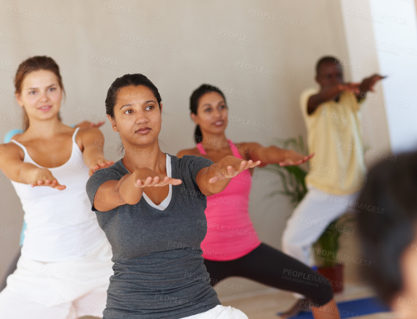 Buy stock photo Yoga class, woman and group with squat, fitness or diversity with health, peace or together for support. People, crowd and lesson for pilates, breathing and solidarity with community at wellness club