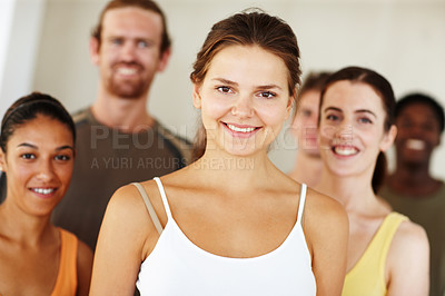 Buy stock photo Portrait, smile or fitness and woman with a group of people in a studio for health, wellness or mindfulness. Exercise, training and pilates with happy young friends together in gym class for workout