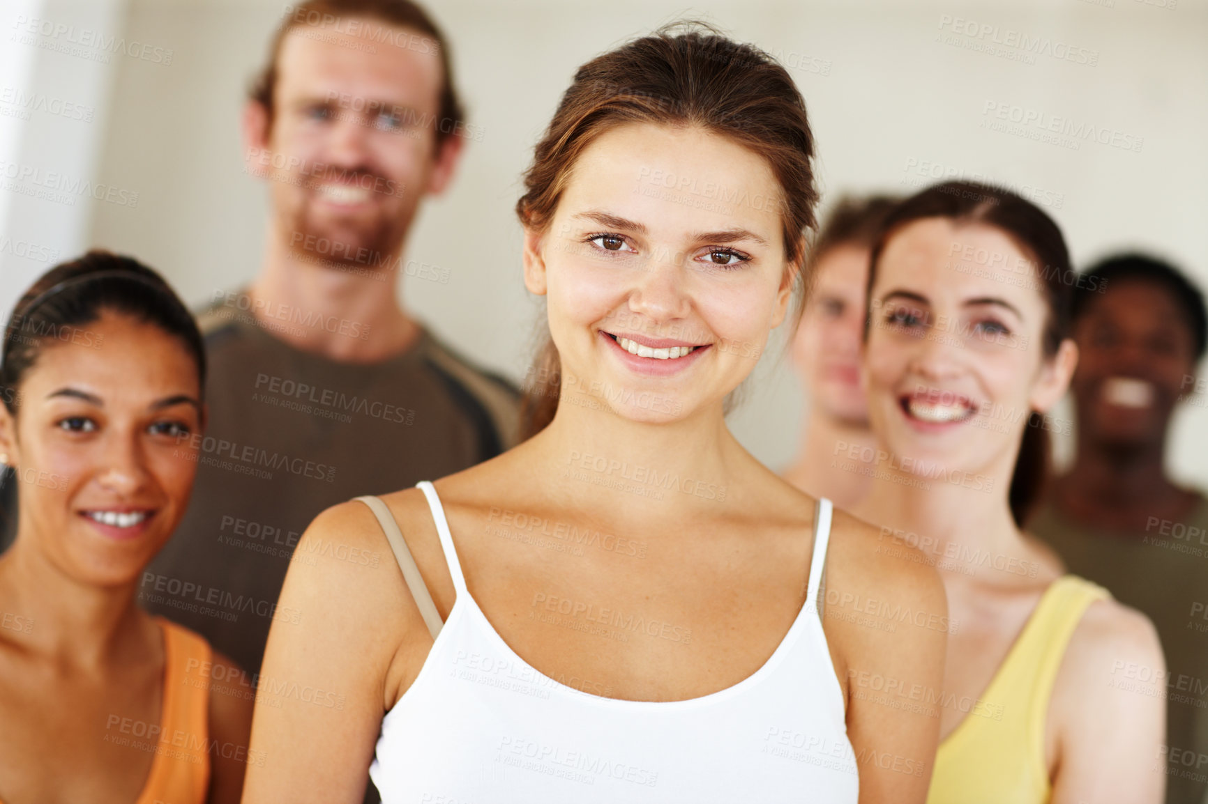 Buy stock photo Portrait, smile or fitness and woman with a group of people in a studio for health, wellness or mindfulness. Exercise, training and pilates with happy young friends together in gym class for workout