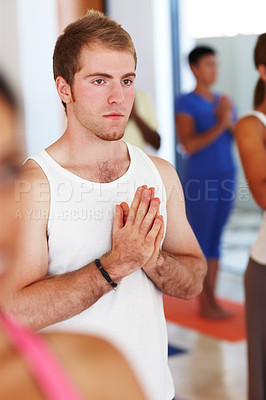 Buy stock photo Namaste, yoga and man in meditation class for fitness, wellness and mindset for healthy body care. Breathing, relax and group of people at club together for balance, mindfulness and zen workout.