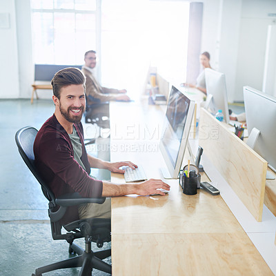 Buy stock photo Shot of a designer at work in an office