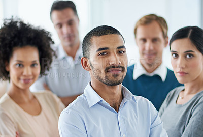 Buy stock photo Portrait of a group of diverse colleagues standing in an office