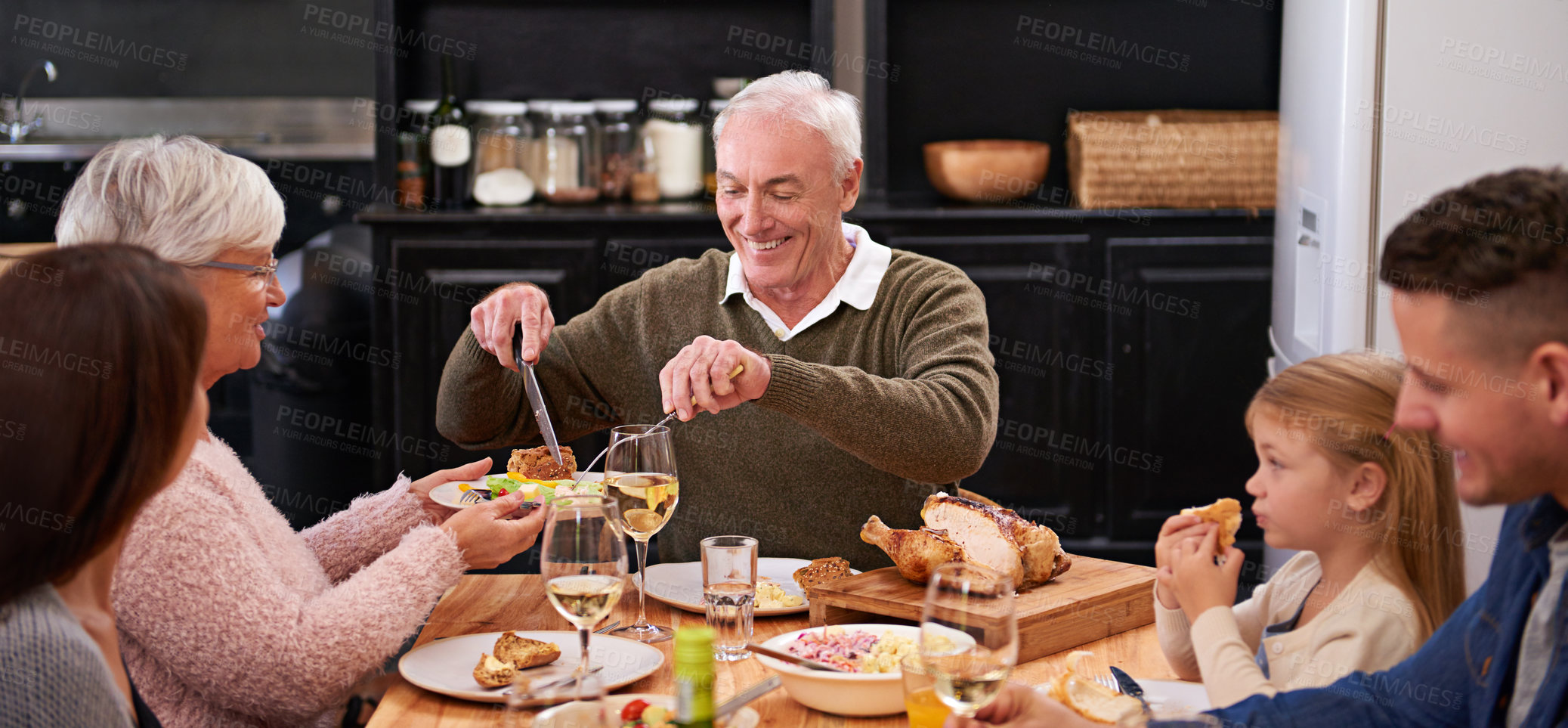 Buy stock photo Happy family, drinks and food at table for celebration, thanksgiving and bonding time. Grandfather, dining room and dinner for supper, feast meal and share at home with grandparents for holiday