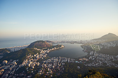 Buy stock photo City, ocean and blue sky with vacation, drone and Rio De Janeiro for summer holiday, urban town and aerial view. Landscape, location and beach with buildings, getaway trip and mountains with sunshine