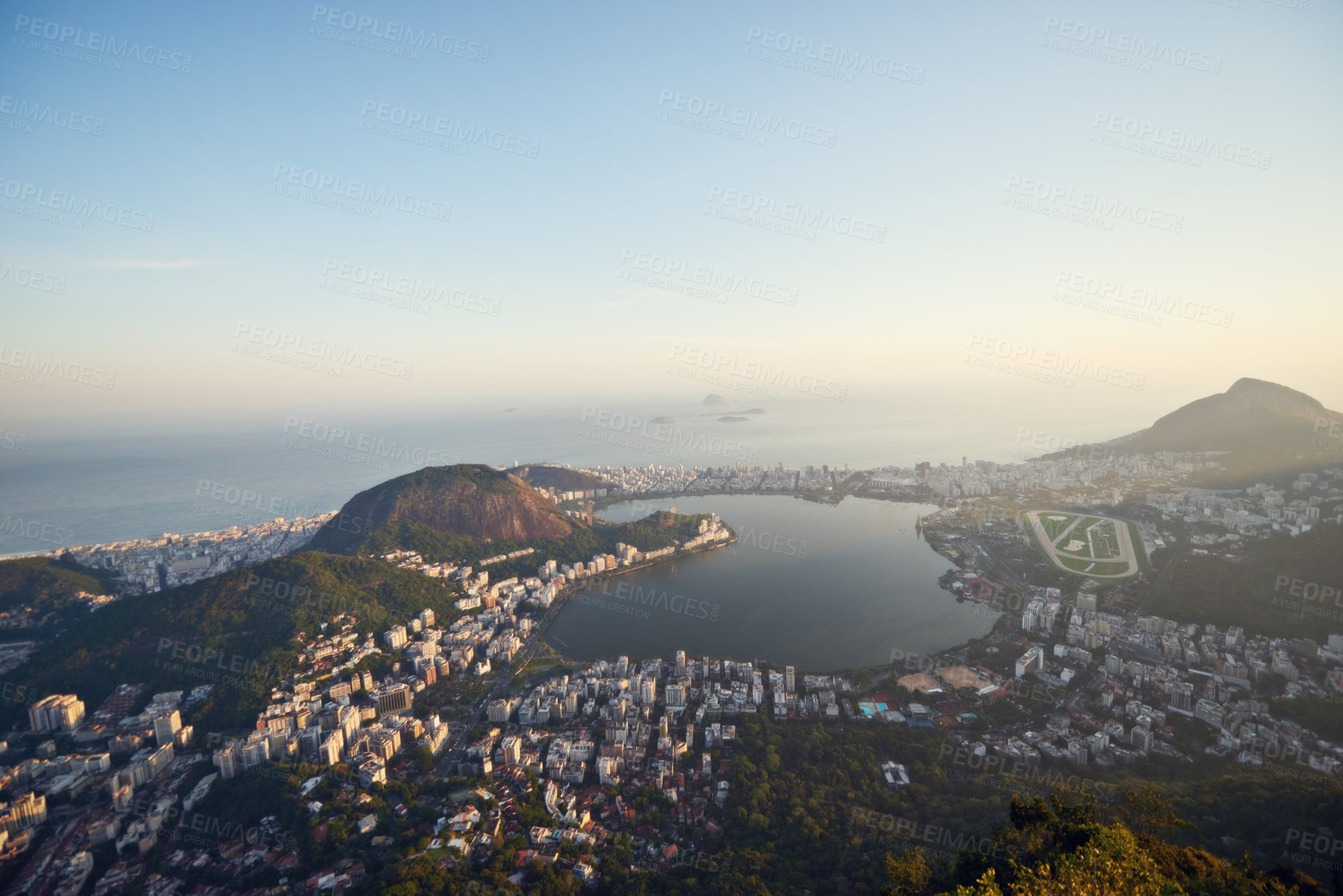 Buy stock photo City, ocean and blue sky with vacation, drone and Rio De Janeiro for summer holiday, urban town and aerial view. Landscape, location and beach with buildings, getaway trip and mountains with sunshine