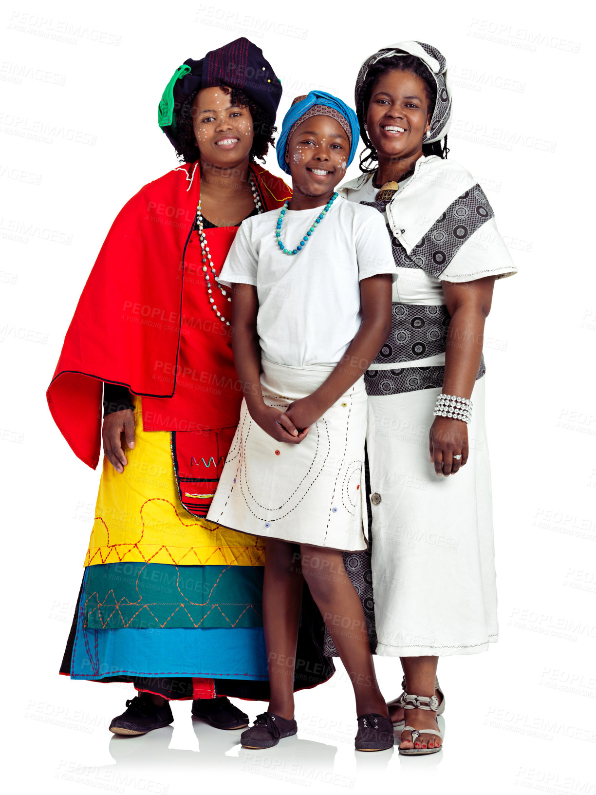 Buy stock photo Studio shot of two traditiaonally dressed african women with a teenage girl isolated on white