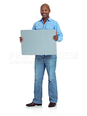 Buy stock photo Studio shot of an african man holding up a blank board against a white background