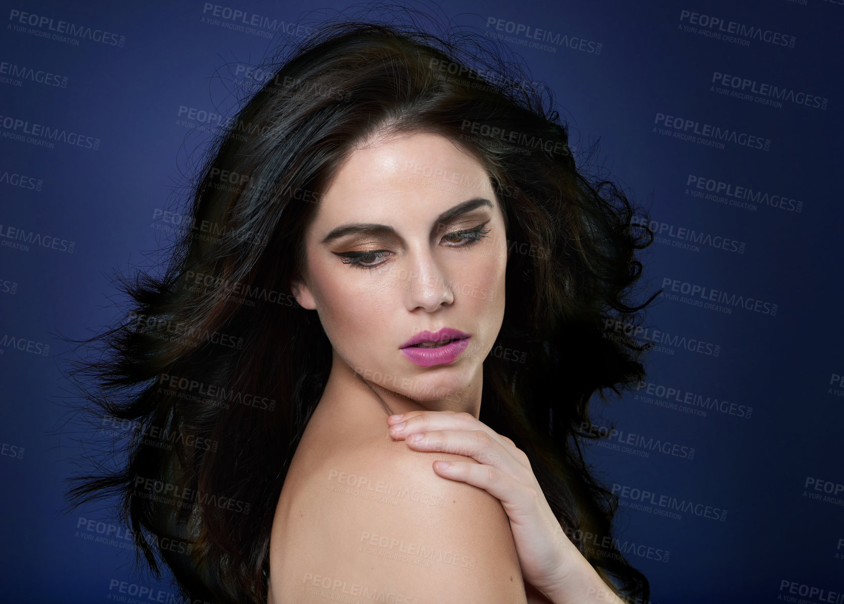 Buy stock photo Beauty, wellness and woman in studio for hair cosmetics, shine and luxury glamour on blue background. Makeup, skin and model with shampoo, scalp or glow haircare results, growth and smooth texture 