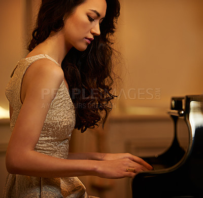 Buy stock photo Mansion, woman and playing piano with musician, lounge and pianist in ballroom with luxury and instrument. Entertainment, palace and fashion of sound artist with song and playing with dark glamour