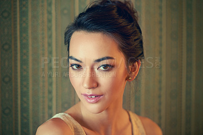 Buy stock photo Portrait of a beautiful and elegant young woman in a green wallpapered room