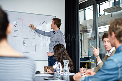Buy stock photo Shot of a diverse group of colleagues in a presentation