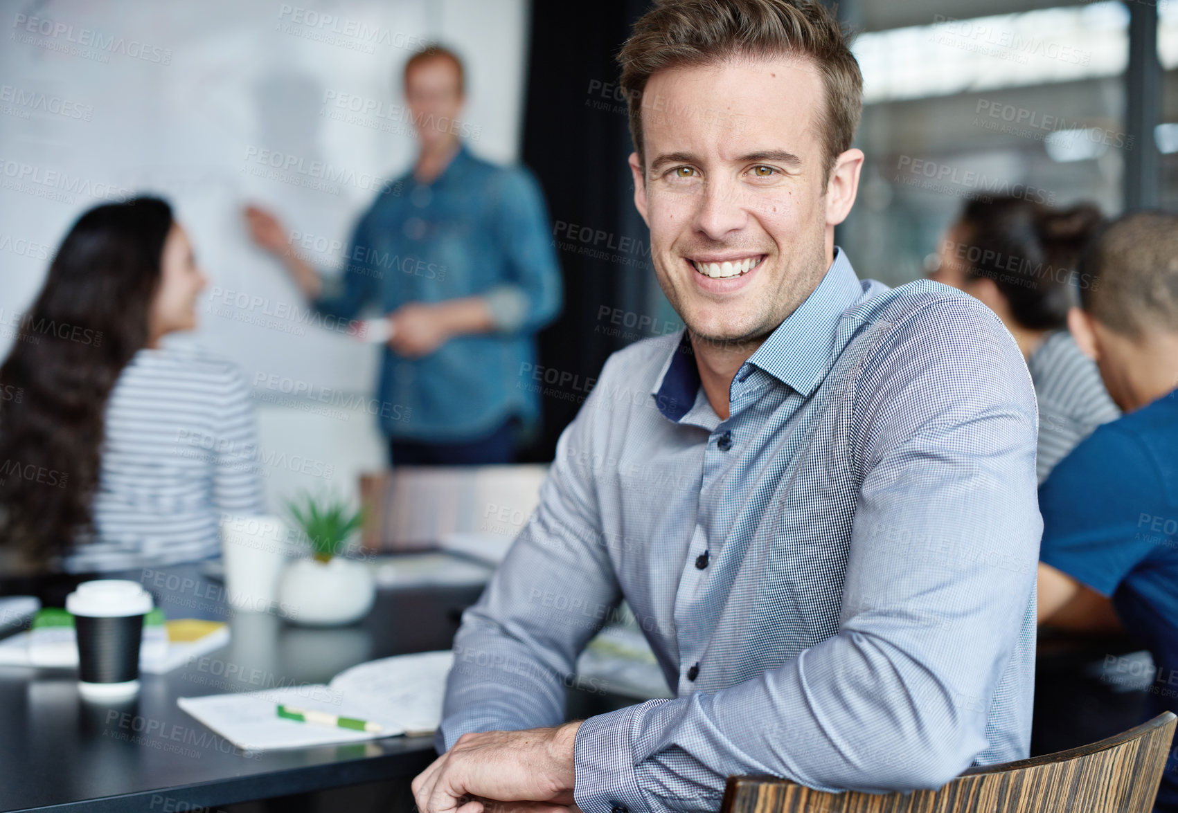 Buy stock photo Boardroom, meeting and portrait of business man at table in office for training seminar or workshop. Collaboration, presentation and smile of happy employee in professional workplace with colleagues