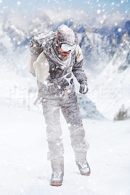 Buy stock photo Shot of a male hiker in extreme terrain