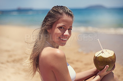 Buy stock photo Portrait, travel or happy woman at beach for coconut drink, holiday or vacation with beverage or nature in Hawaii. Smile, relax and girl at ocean or sea in summer for tanning or tropical adventure