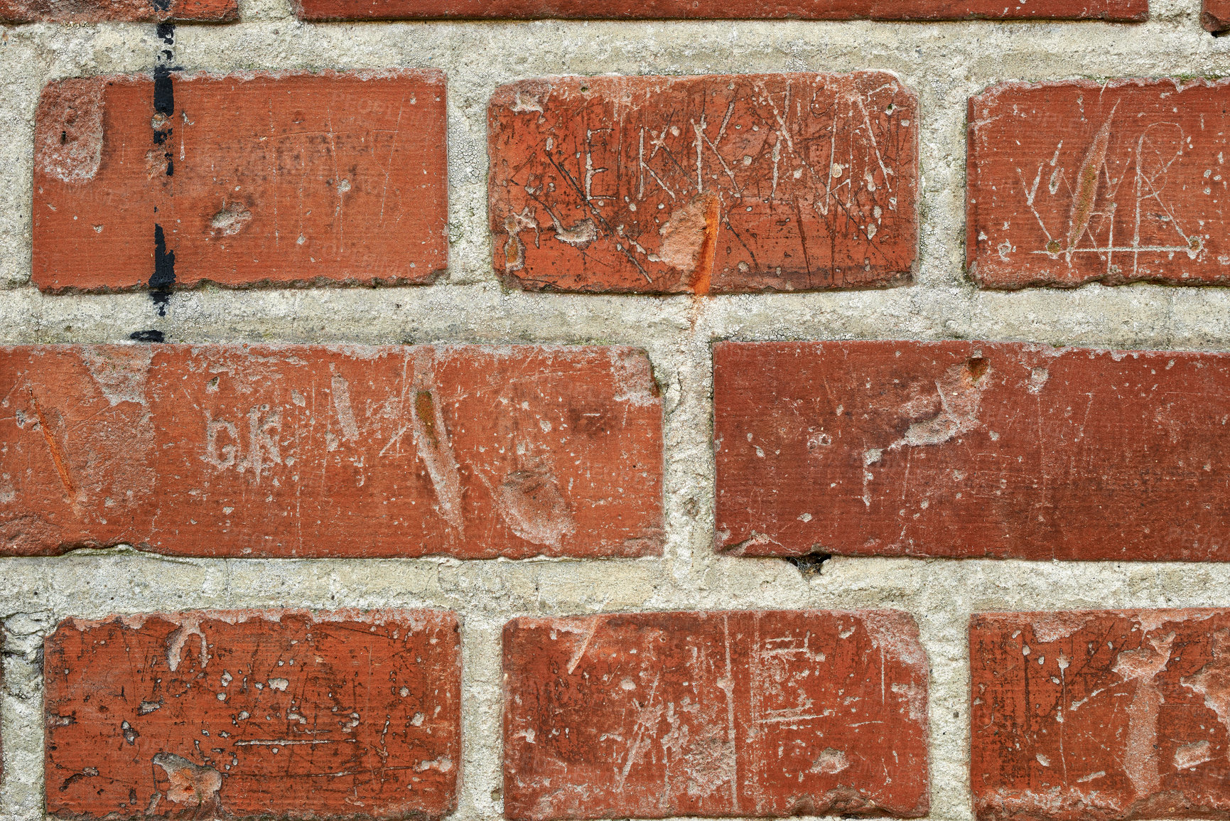 Buy stock photo Red, brick and wall background with rough texture, concrete pattern and masonry in architecture. Cracked stone, closeup and wallpaper space with building for design, rustic material or vintage detail