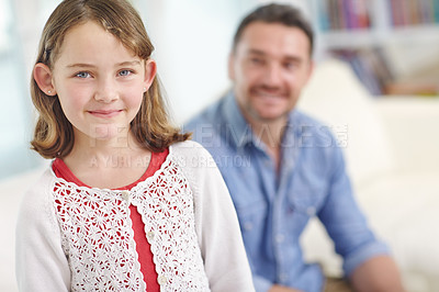 Buy stock photo Portrait of an adorable little girl spending the day with her father at home