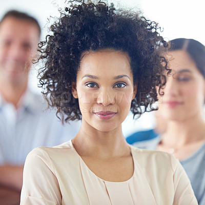 Buy stock photo Portrait of a beautiful woman with her colleagues in the background