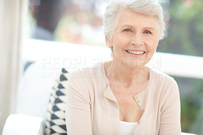 Buy stock photo Portrait of a happy elderly woman enjoying a relaxing day at home