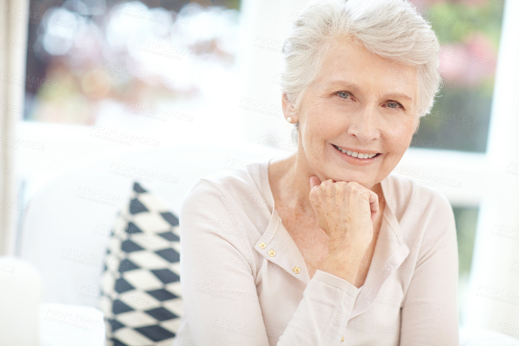 Buy stock photo Portrait of a happy elderly woman enjoying a relaxing day at home