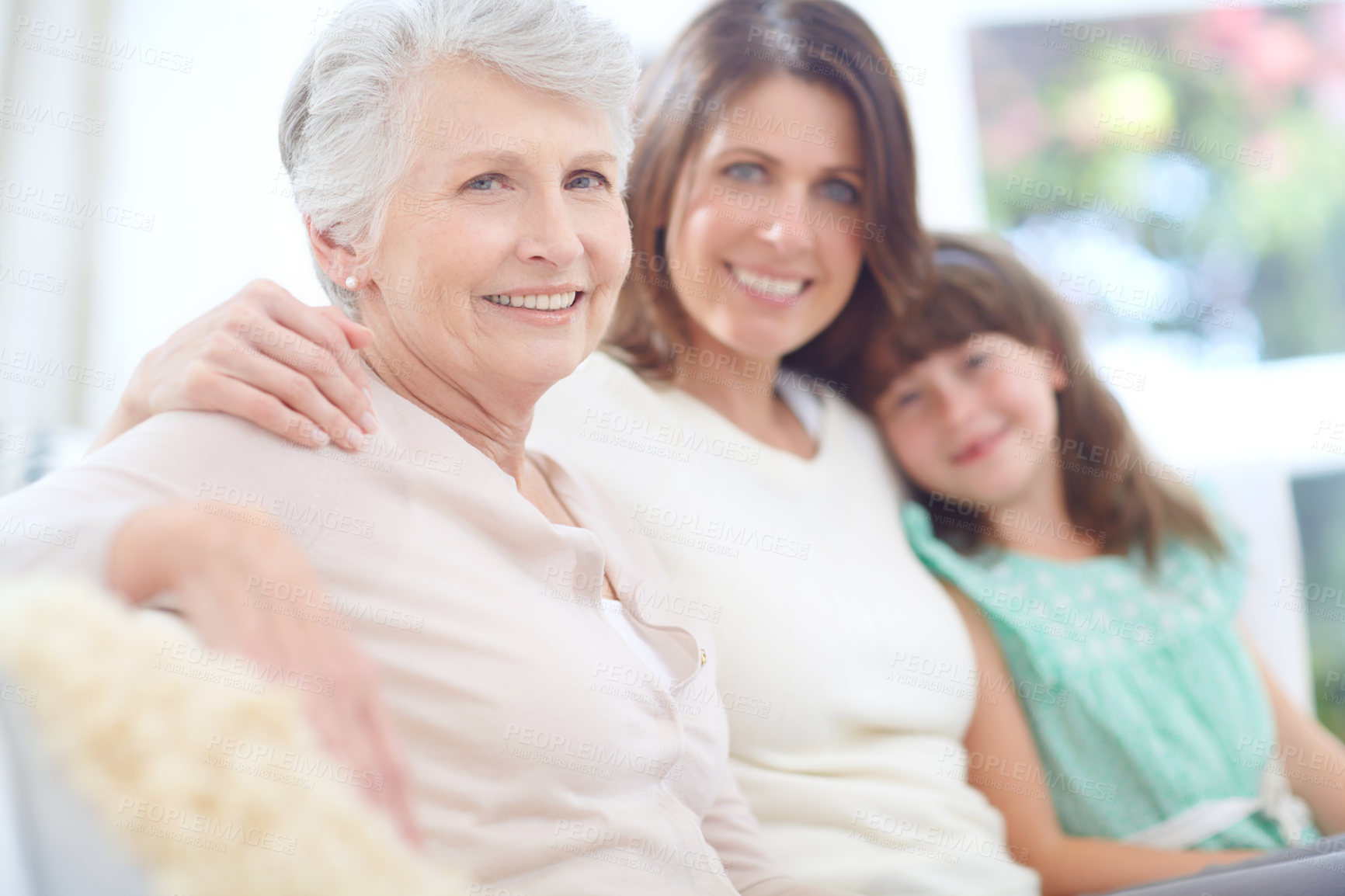 Buy stock photo Portrait, relax and senior woman with family on sofa in living room for bonding together at home. Smile, rest and elderly person with daughter and grandchild for generations connection at house.