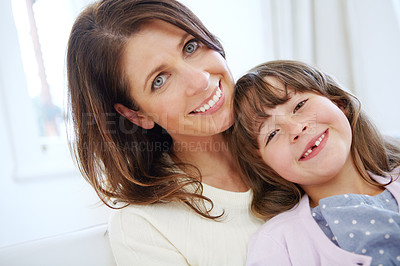 Buy stock photo Portrait of a loving mother and daughter spending time together at home