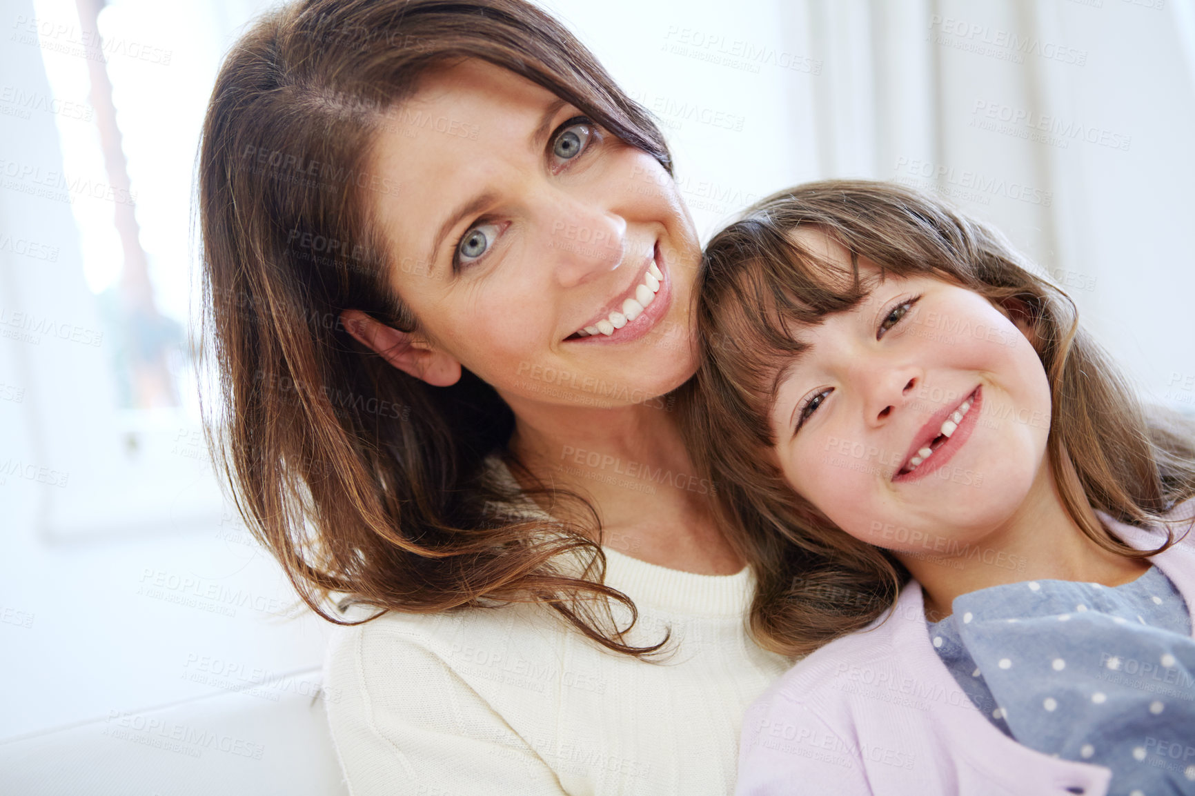 Buy stock photo Portrait of a loving mother and daughter spending time together at home