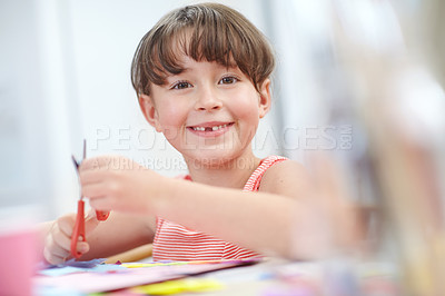 Buy stock photo Portrait of a cute little girl busy with arts and crafts