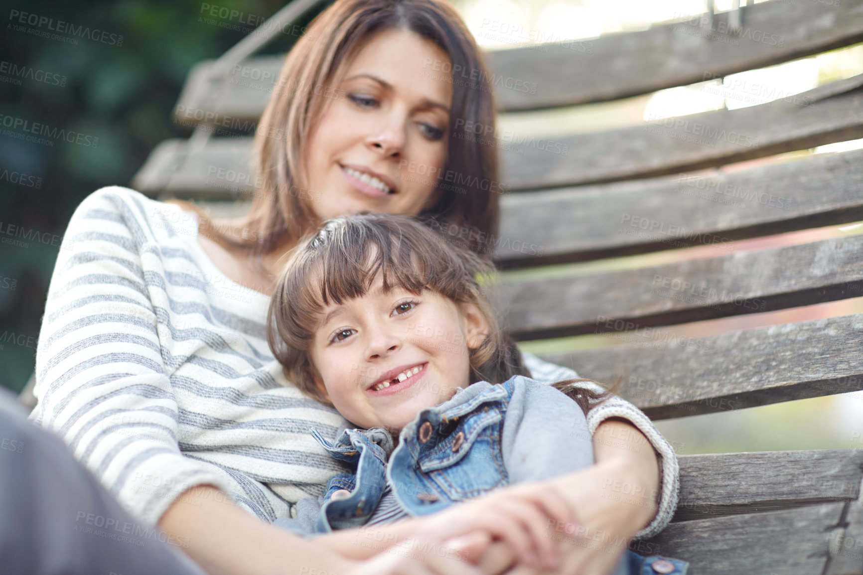 Buy stock photo Portrait of a little girl and her mother lying on a hammock